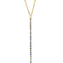 Gold necklace with blue gemstones on a white background