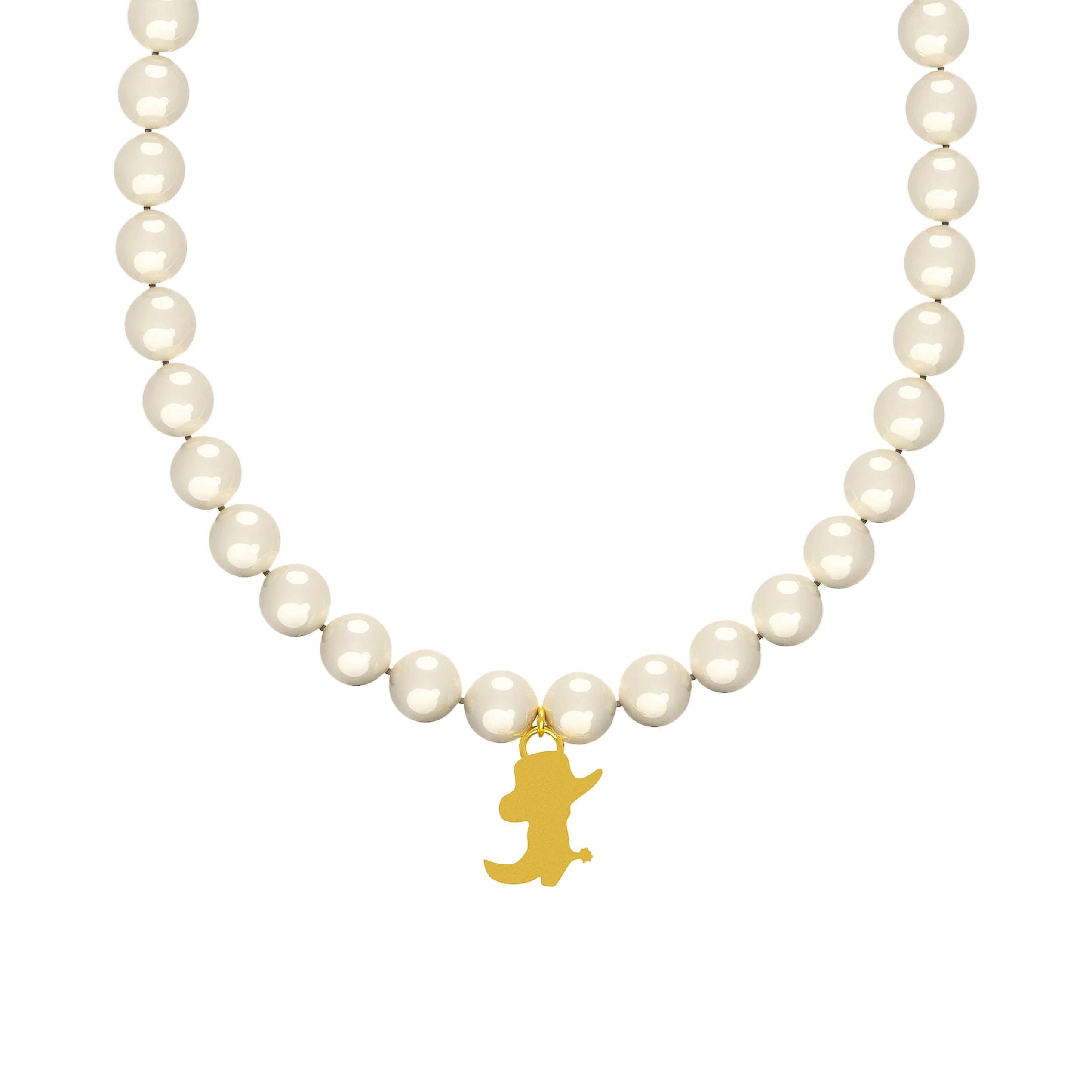 Pearl necklace with a gold bear pendant on a beige background