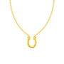 Gold horseshoe necklace on a white background