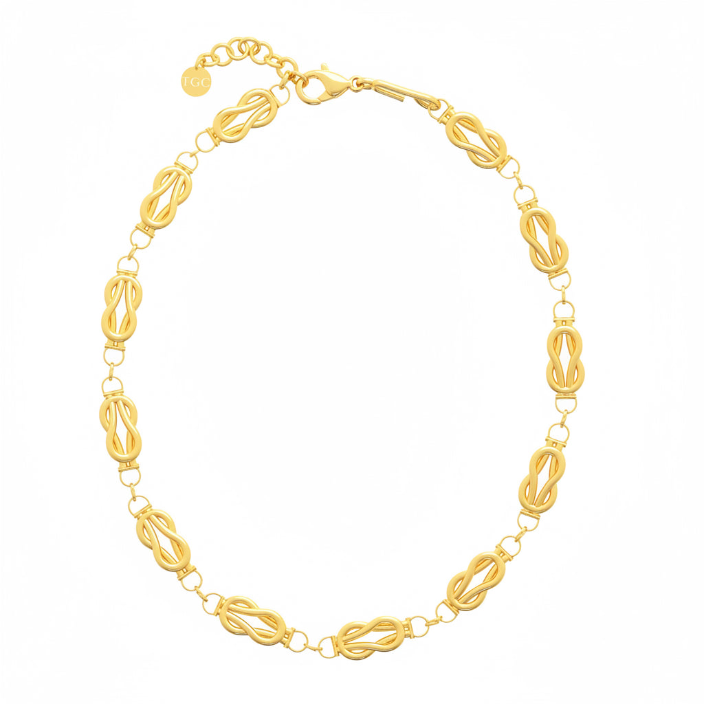 Gold necklace on a white background