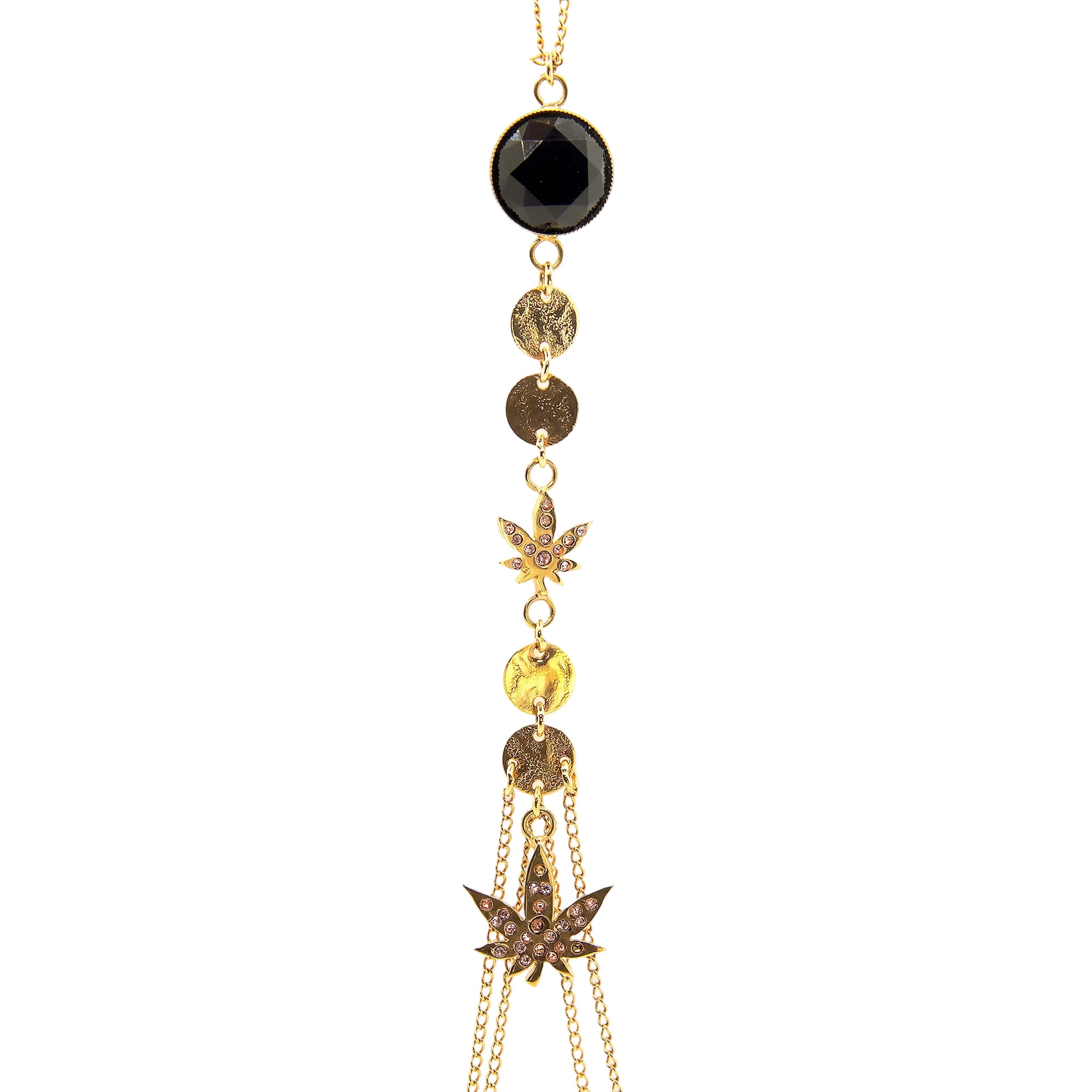 Necklace with gold and black beads on a white background