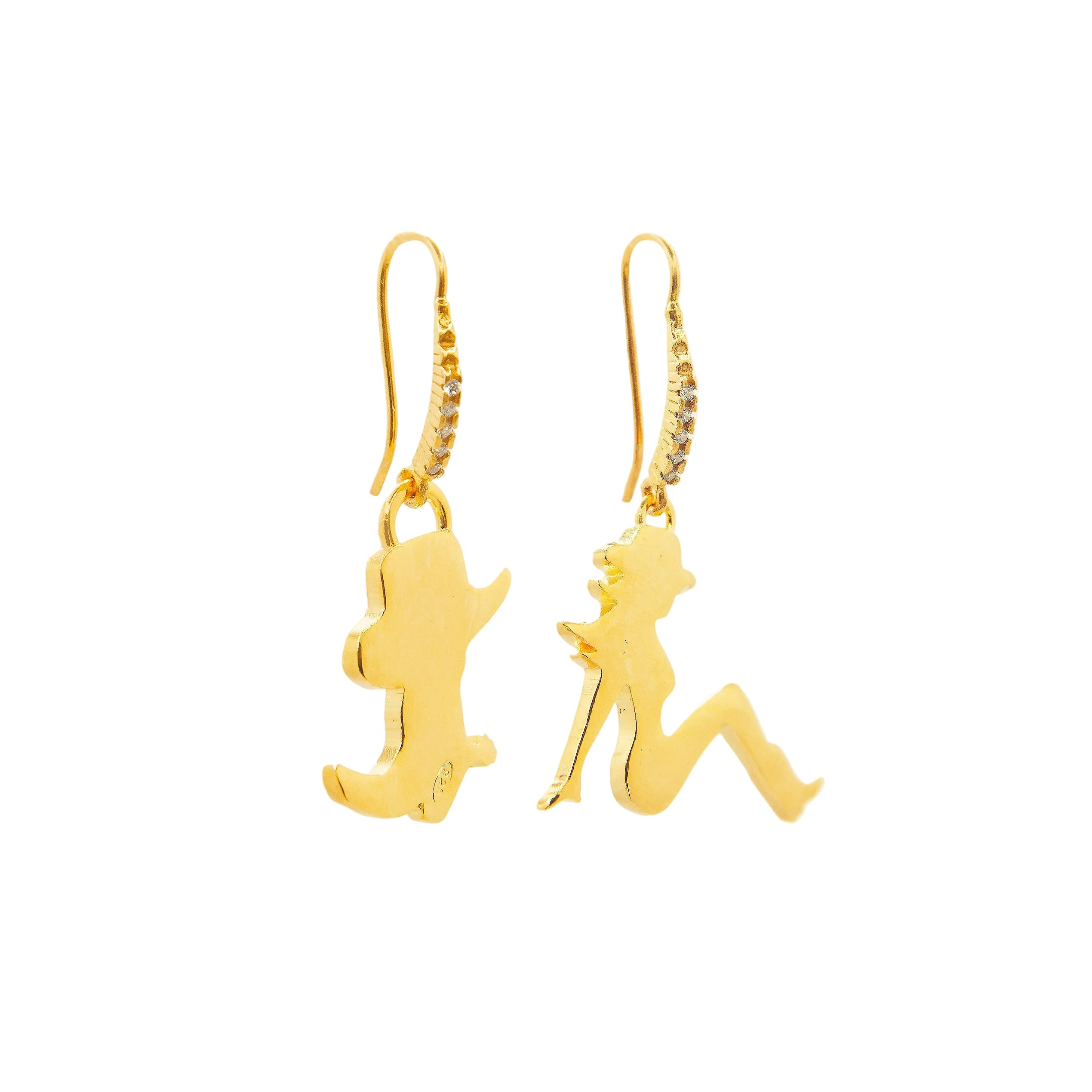 Gold silhouette earrings on a white background