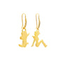 Gold silhouette earrings on a white background