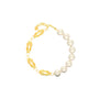 Pearl bracelet with gold links on a white background