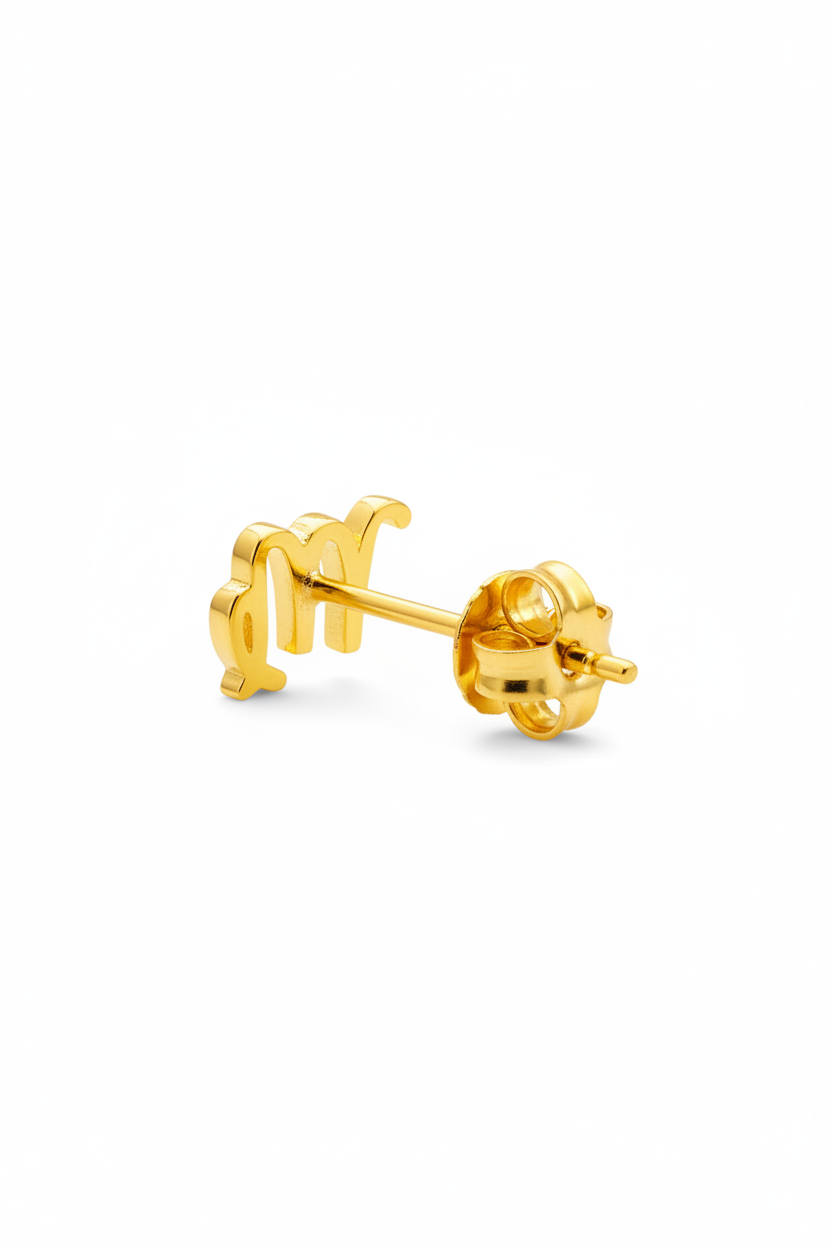 Gold Virgo zodiac sign on a white background
