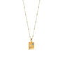 A gold-colored necklace with a pendant shaped like the constellation Scorpio, featuring light blue and lilac zirconia stones.